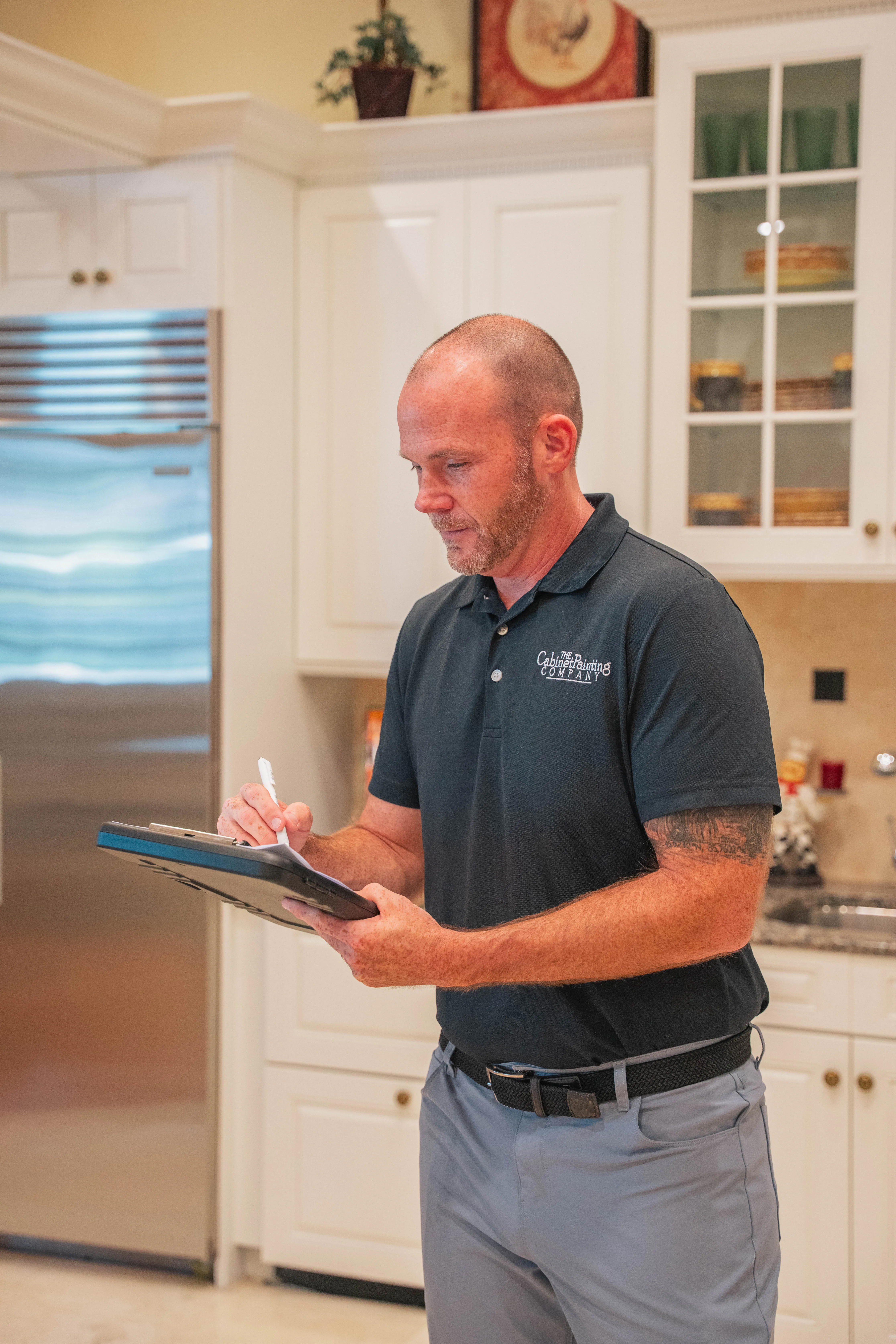 Brian Shaffer reviewing project notes during a kitchen consultation